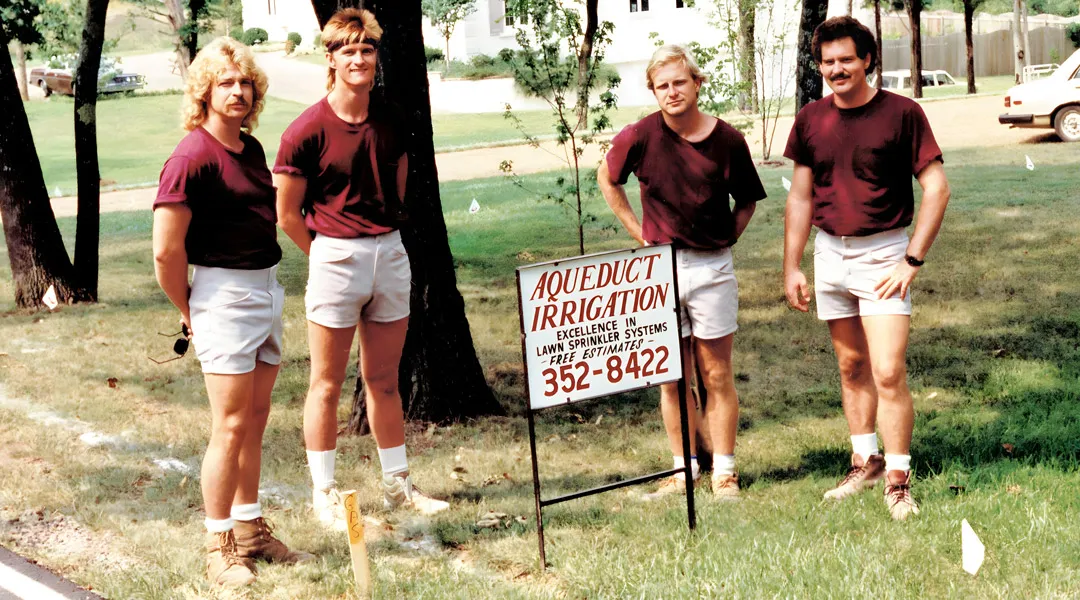 Four men, including owner William Holt (far right), in 1988 when Aqueduct Irrigation / Southern Light was founded.